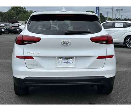 2019 Hyundai Tucson SE is a White 2019 Hyundai Tucson SE SUV in Monroe NC