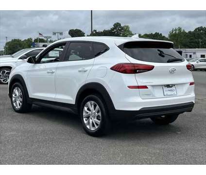 2019 Hyundai Tucson SE is a White 2019 Hyundai Tucson SE SUV in Monroe NC