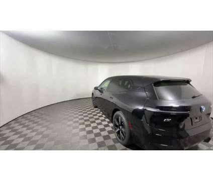 2025 BMW iX xDrive50 is a Black 2025 BMW 325 Model iX SUV in Freeport NY