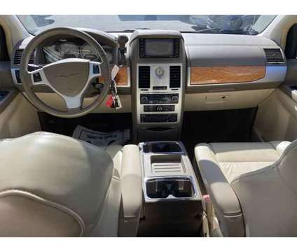 2008 Chrysler Town and Country Limited is a White 2008 Chrysler town &amp; country Van in Athens GA