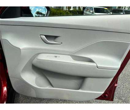 2024 Hyundai Kona SE is a Red 2024 Hyundai Kona SE SUV in Sanford FL