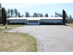 Harrison 1BA, 5000 Square Foot building on 9.1 Acres just