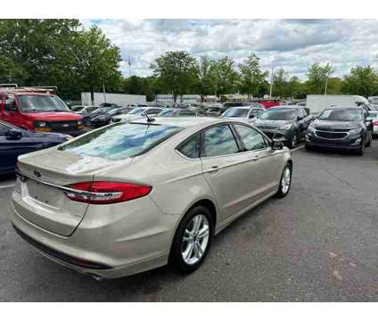 2018 Ford Fusion for sale is a Gold 2018 Ford Fusion Car for Sale in Delran NJ