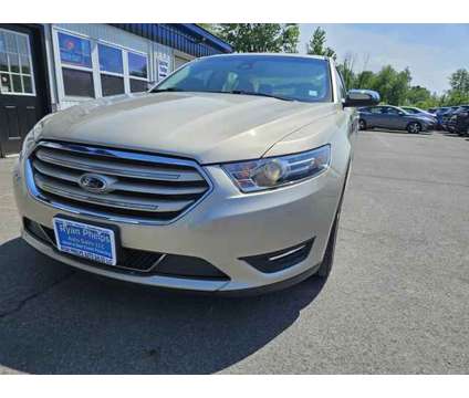 2017 Ford Taurus for sale is a Tan 2017 Ford Taurus Car for Sale in Phoenix NY