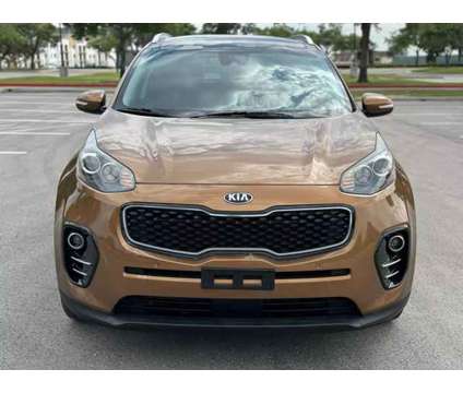 2017 Kia Sportage for sale is a Brown 2017 Kia Sportage 4dr Car for Sale in Austin TX