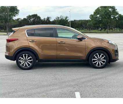 2017 Kia Sportage for sale is a Brown 2017 Kia Sportage 4dr Car for Sale in Austin TX