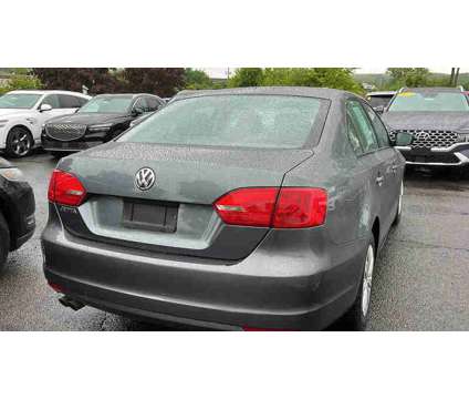 2013UsedVolkswagenUsedJetta is a Grey 2013 Volkswagen Jetta Car for Sale in Danbury CT