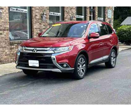 2016 Mitsubishi Outlander SEL 4WD Premium Package is a Red 2016 Mitsubishi Outlander SEL Car for Sale in Clifton Park NY