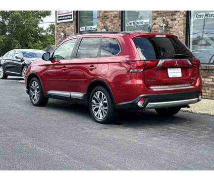 2016 Mitsubishi Outlander SEL 4WD Premium Package is a Red 2016 Mitsubishi Outlander SEL Car for Sale in Clifton Park NY