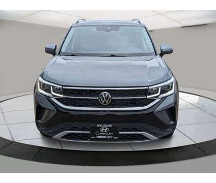 2022 Volkswagen Taos SEL is a Grey, Silver 2022 Car for Sale in Greeley CO
