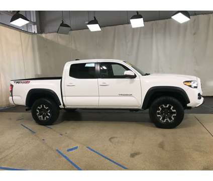 2023 Toyota Tacoma TRD Off Road is a White 2023 Toyota Tacoma TRD Off Road Car for Sale in Park Ridge IL