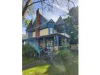 Great 1894 Queen Anne Victorian style home on Albion's historic North Main St.