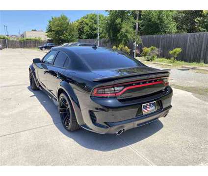 2023 Dodge Charger R/T Scat Pack Widebody is a Black 2023 Dodge Charger R/T Scat Pack Sedan in Dallas TX