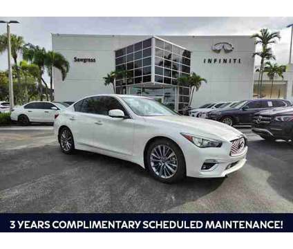 2024 Infiniti Q50 Luxe is a White 2024 Infiniti Q50 Sedan in Fort Lauderdale FL