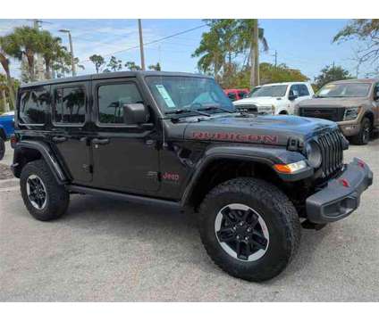 2020 Jeep Wrangler Unlimited Rubicon is a Black 2020 Jeep Wrangler Unlimited Rubicon SUV in Naples FL