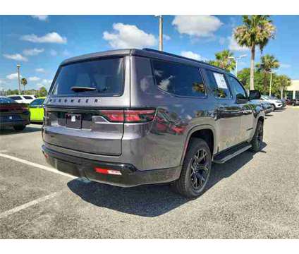2024 Jeep Wagoneer L Series II is a Grey 2024 Jeep Wagoneer Car for Sale in Orlando FL