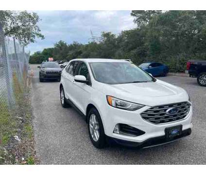 2021 Ford Edge SEL is a White 2021 Ford Edge SEL Car for Sale in Orlando FL