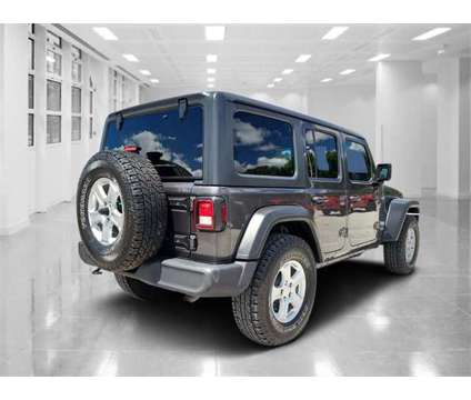 2020 Jeep Wrangler Unlimited Sport S is a Grey 2020 Jeep Wrangler Unlimited Car for Sale in Orlando FL