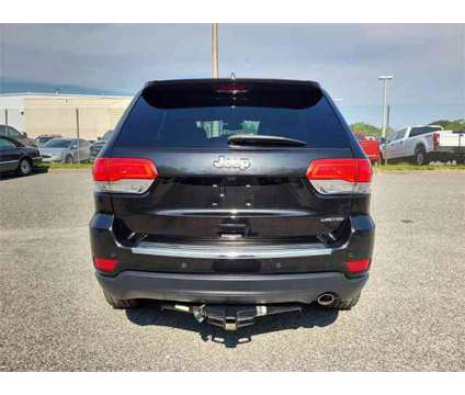 2015 Jeep Grand Cherokee Limited is a Black 2015 Jeep grand cherokee Limited Car for Sale in Orlando FL