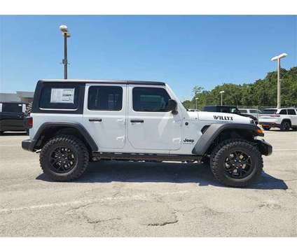 2024 Jeep Wrangler Willys Wheeler is a White 2024 Jeep Wrangler Car for Sale in Orlando FL