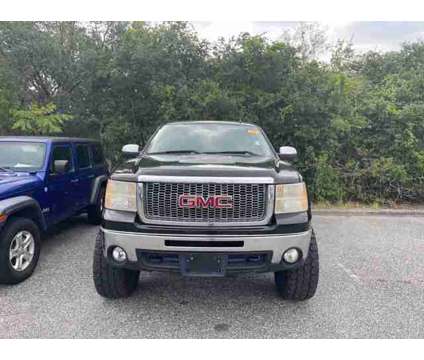 2011 Gmc Sierra 1500 SLE is a Black 2011 GMC Sierra 1500 SLE Car for Sale in Orlando FL