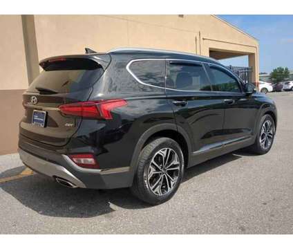 2020 Hyundai Santa Fe Limited 2.0T is a Black 2020 Hyundai Santa Fe Limited SUV in Ocala FL