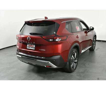 2021 Nissan Rogue Platinum FWD is a Red 2021 Nissan Rogue Station Wagon in Orlando FL