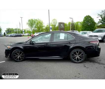 2021 Toyota Camry SE AWD is a Black 2021 Toyota Camry SE Sedan in Queensbury NY