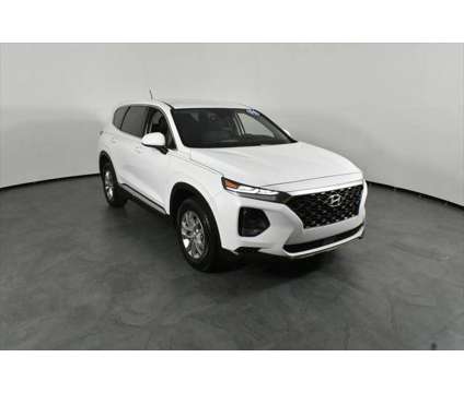 2019 Hyundai Santa Fe SE is a White 2019 Hyundai Santa Fe SE SUV in Orlando FL