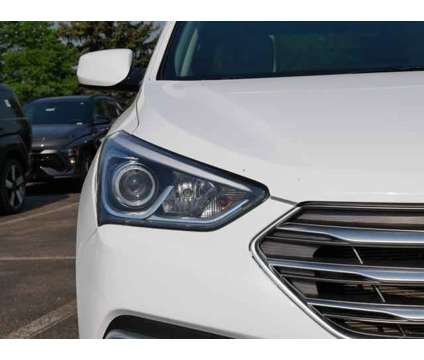 2018 Hyundai Santa Fe Sport 2.4L is a White 2018 Hyundai Santa Fe Sport 2.4L Car for Sale in Burnsville MN