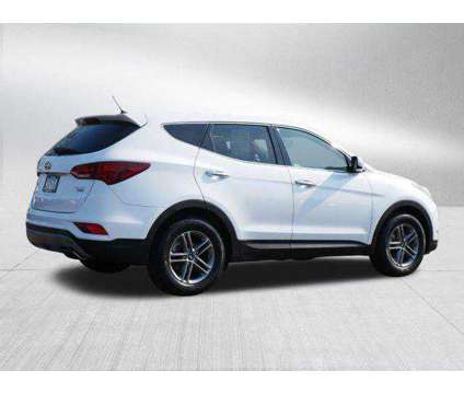 2018 Hyundai Santa Fe Sport 2.4L is a White 2018 Hyundai Santa Fe Sport 2.4L Car for Sale in Burnsville MN