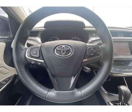 2014 Toyota Avalon Hybrid Limited is a White 2014 Toyota Avalon Hybrid Limited Hybrid in Rosenberg TX
