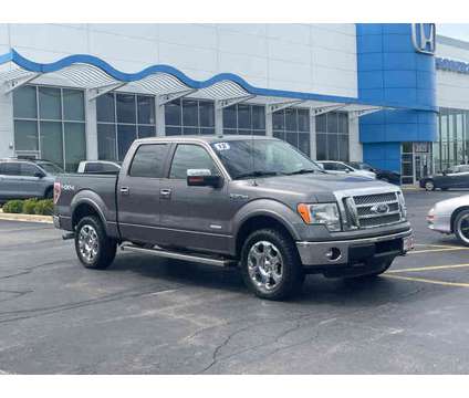 2012 Ford F-150 Lariat is a Grey 2012 Ford F-150 Lariat Car for Sale in Elgin IL