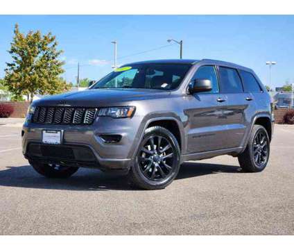 2017 Jeep Grand Cherokee Altitude is a Grey 2017 Jeep grand cherokee Altitude Car for Sale in Denver CO