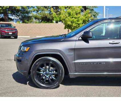 2017 Jeep Grand Cherokee Altitude is a Grey 2017 Jeep grand cherokee Altitude Car for Sale in Denver CO