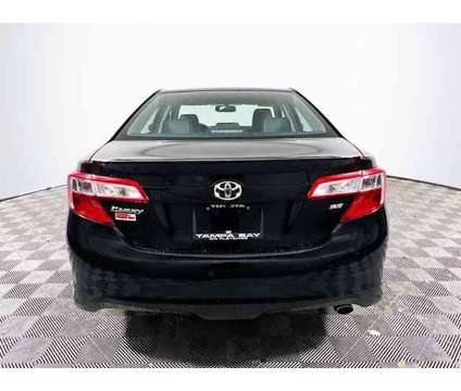 2012 Toyota Camry SE is a Black 2012 Toyota Camry SE Car for Sale in Tampa FL