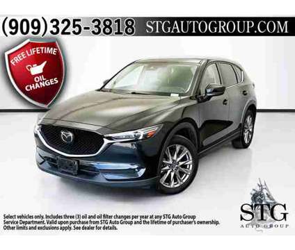 2021 Mazda CX-5 Grand Touring Reserve is a Black 2021 Mazda CX-5 Grand Touring SUV in Montclair CA