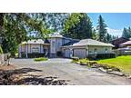 Steamboat Island Rd home with water views