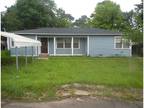 Foreclosure Property: E 32nd St