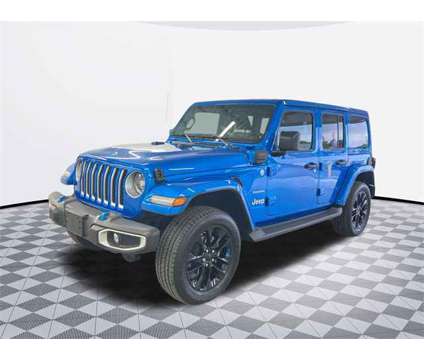 2023 Jeep Wrangler Sahara 4xe is a Blue 2023 Jeep Wrangler Sahara SUV in Catonsville MD