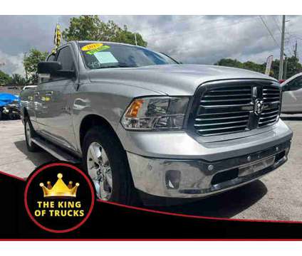 2015 Ram 1500 Quad Cab for sale is a Silver 2015 RAM 1500 Model Car for Sale in Miami FL