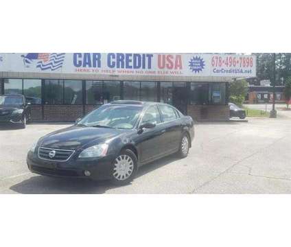2003 Nissan Altima for sale is a Black 2003 Nissan Altima 2.5 Trim Car for Sale in Lithonia GA