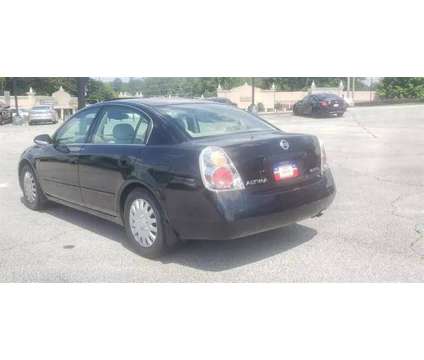 2003 Nissan Altima for sale is a Black 2003 Nissan Altima 2.5 Trim Car for Sale in Lithonia GA