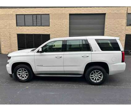 2015 Chevrolet Tahoe for sale is a White 2015 Chevrolet Tahoe 1500 4dr Car for Sale in Alpharetta GA