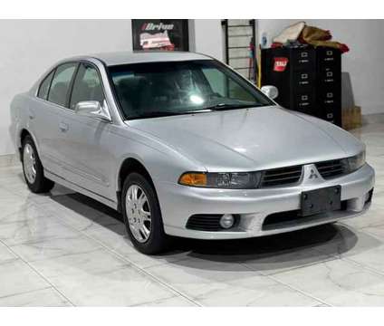 2003 Mitsubishi Galant for sale is a Silver 2003 Mitsubishi Galant Car for Sale in Houston TX