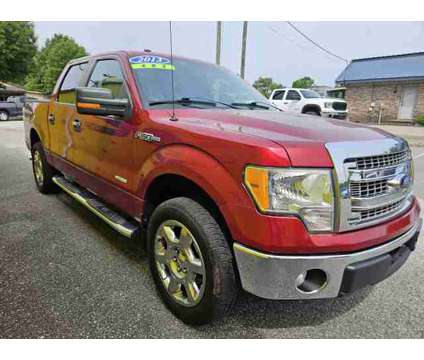 2013 Ford F150 SuperCrew Cab for sale is a Red 2013 Ford F-150 SuperCrew Car for Sale in Hartsville SC