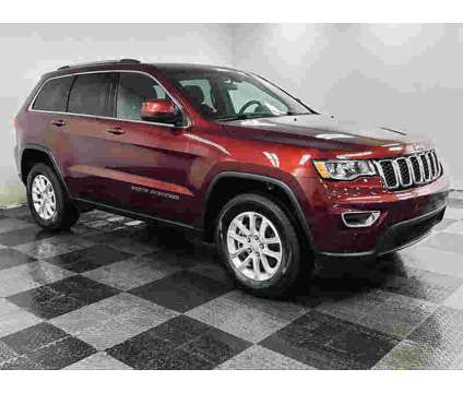2021UsedJeepUsedGrand Cherokee is a Red 2021 Jeep grand cherokee Car for Sale in Brunswick OH