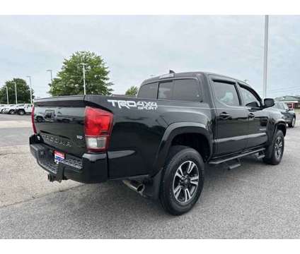2016 Toyota Tacoma TRD Sport is a Black 2016 Toyota Tacoma TRD Sport Car for Sale in Southaven MS