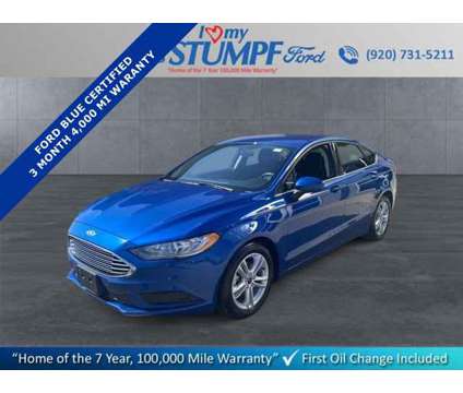 2018 Ford Fusion SE is a Blue 2018 Ford Fusion SE Car for Sale in Appleton WI