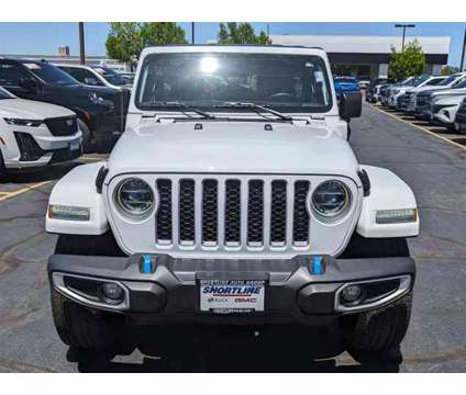 2022 Jeep Wrangler Unlimited Sahara 4xe is a White 2022 Jeep Wrangler Unlimited Car for Sale in Aurora CO